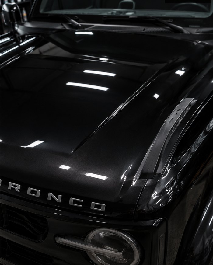 Car paint before and after cut, polish and coating — after